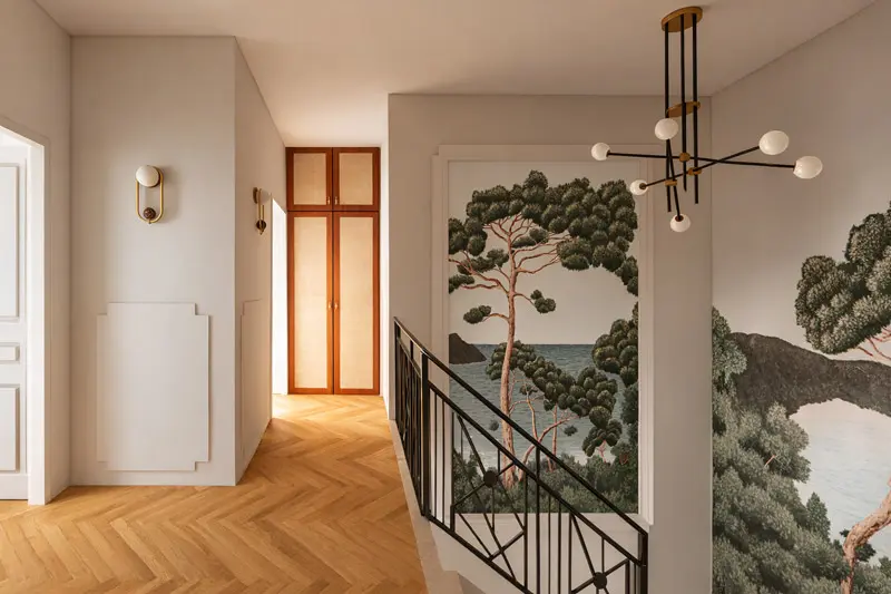 palier couloir soubassements moulurés cimaises papier peint panoramique parquet bâtons rompus maison de maître Art Déco